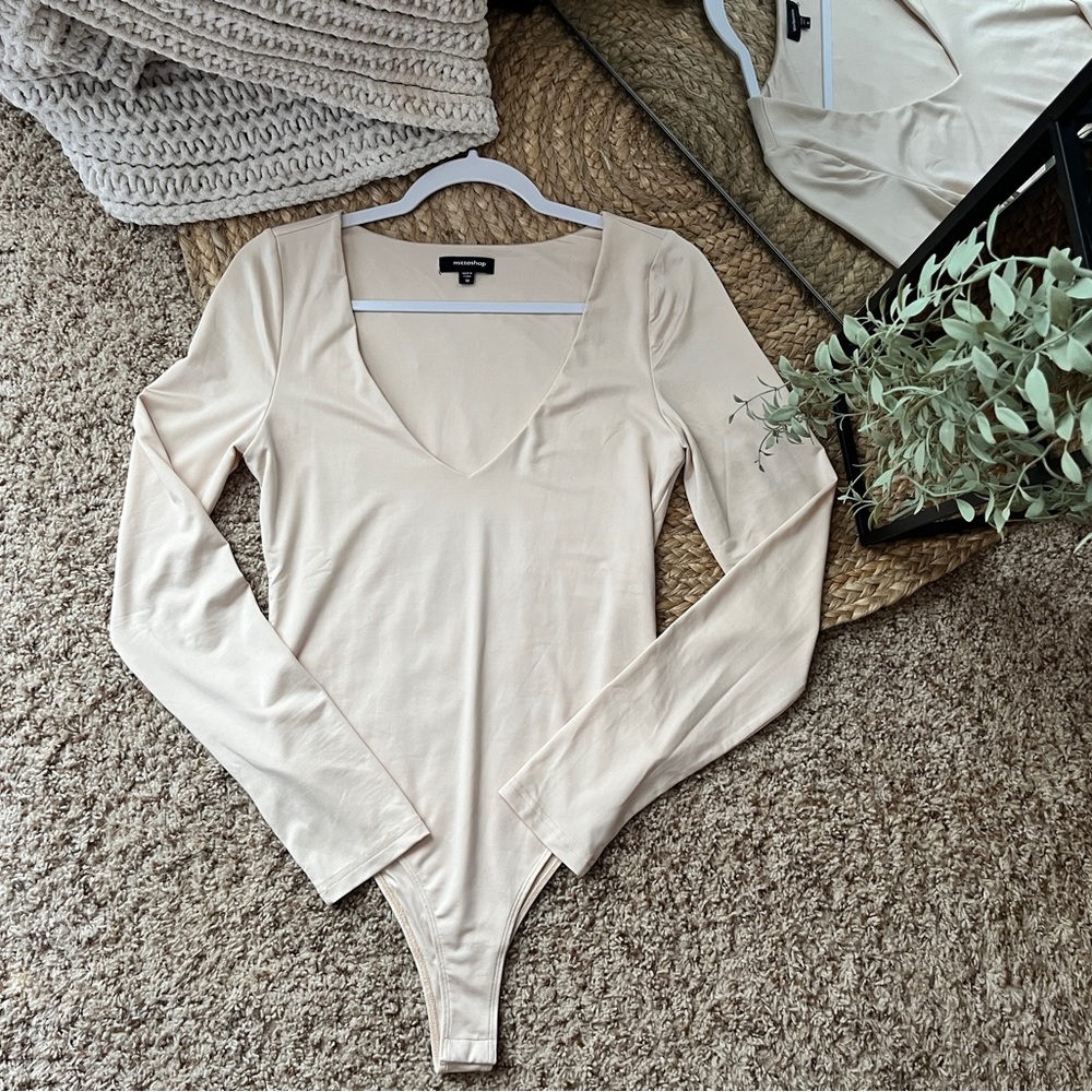 Size medium, boutique bodysuit (Gypsy Blossoms)